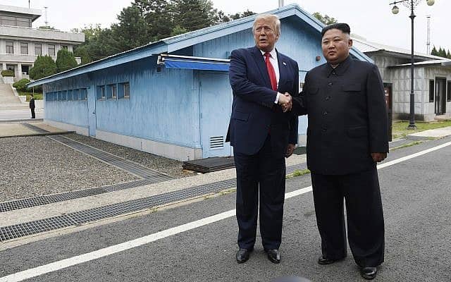 טראמפ וקים ג&#039;ונג און בצפון קוריאה (צילום: AP)