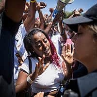 Ethiopians and supporters protest outside the Knesset, against police violence and discrimination following the death of 19-year-old Ethiopian, Solomon Tekah who was shot and killed few days ago in Kiryat Haim by an off-duty police officer, in Jerusalem, July 15, 2019. (צילום: Yonatan Sindel-Flash90)