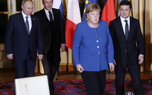 מימין: נשיא אוקראינה זלנסקי, קנצלרית גרמניה מרקל, נשיא צרפת מקרון ונשיא רוסיה פוטין בארמון האליזה, אתמול (צילום: Thibault Camus, AP)
