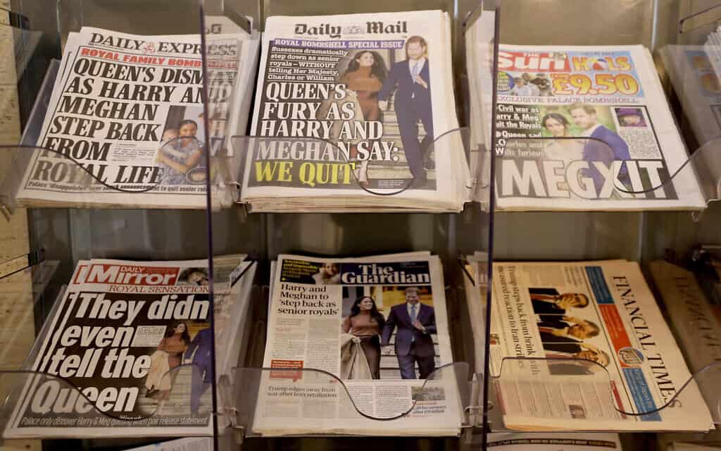 שערי העיתונים בבריטניה ביום שאחרי הודעת הנסיך הארי ומייגן כי ברצונם לפרוש מבית המלוכה (צילום: AP Photo/Kirsty Wigglesworth)