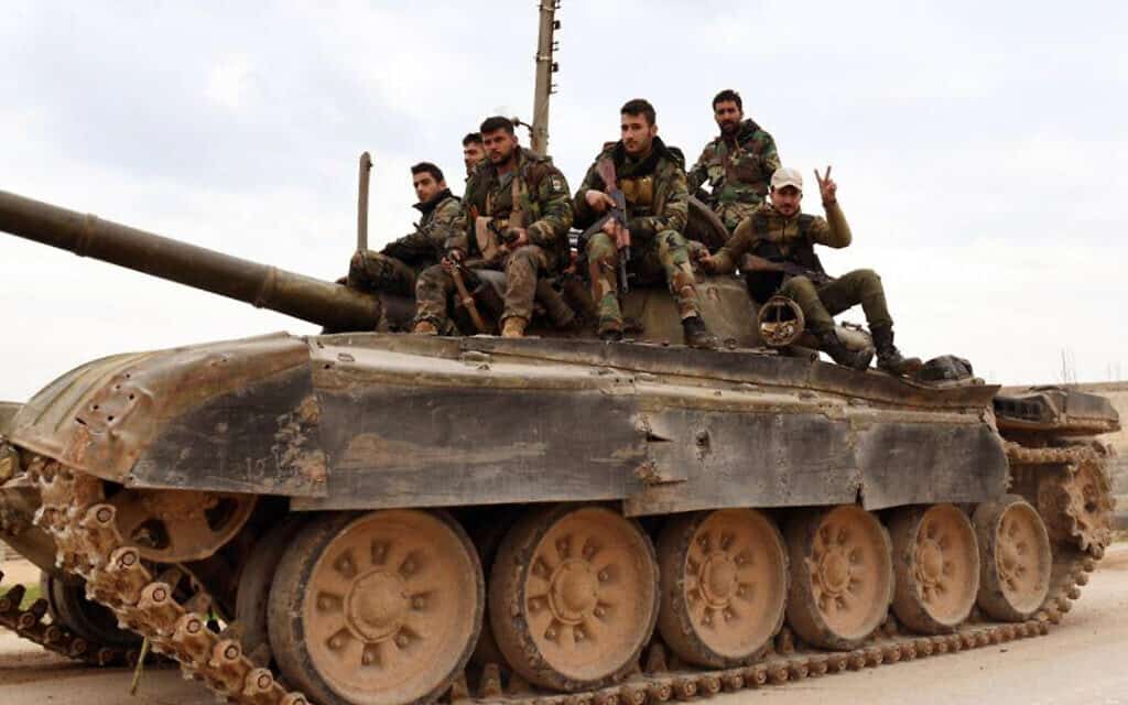 צבא סוריה משתלט על כפר בצפון המדינה, פברואר 2020 (צילום: SANA via AP)