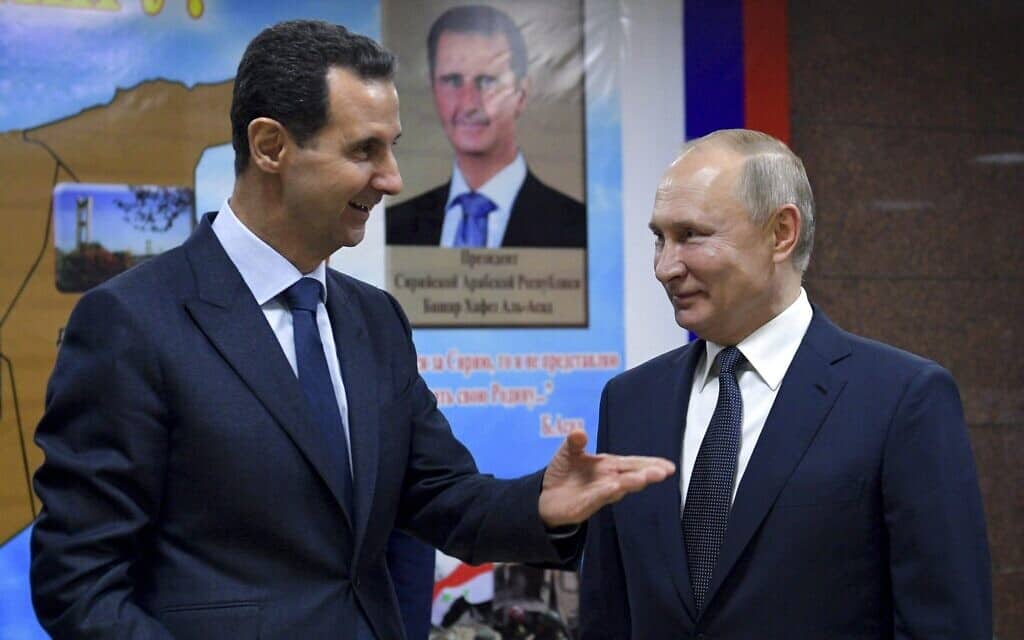 ולדימיר פוטין ובשאר אל אסד, בביקורו של נשיא רוסיה בדמשק, ב-7 בינואר 2020 (צילום: Alexei Druzhinin, Sputnik, Kremlin Pool Photo via AP)