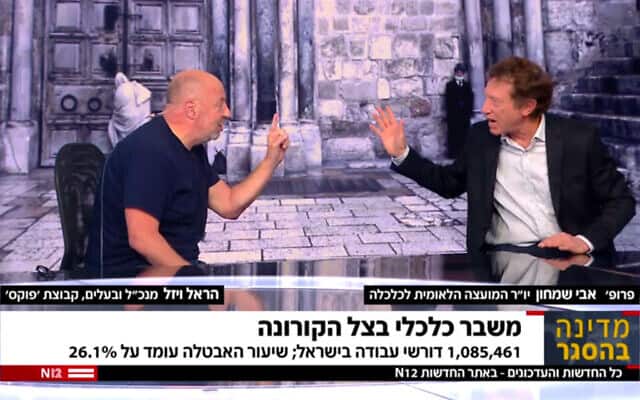 אבי שמחון והראל ויזל מתווכחים באולפן חדשות 12 (צילום: צילום מסך, ערוץ 12)