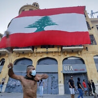 התנגשויות בין מפגינים למשטרה במהלך המחאה נגד האליטות הפוליטיות בלבנון, אוגוסט 2020 (צילום: AP Photo/Hassan Ammar)