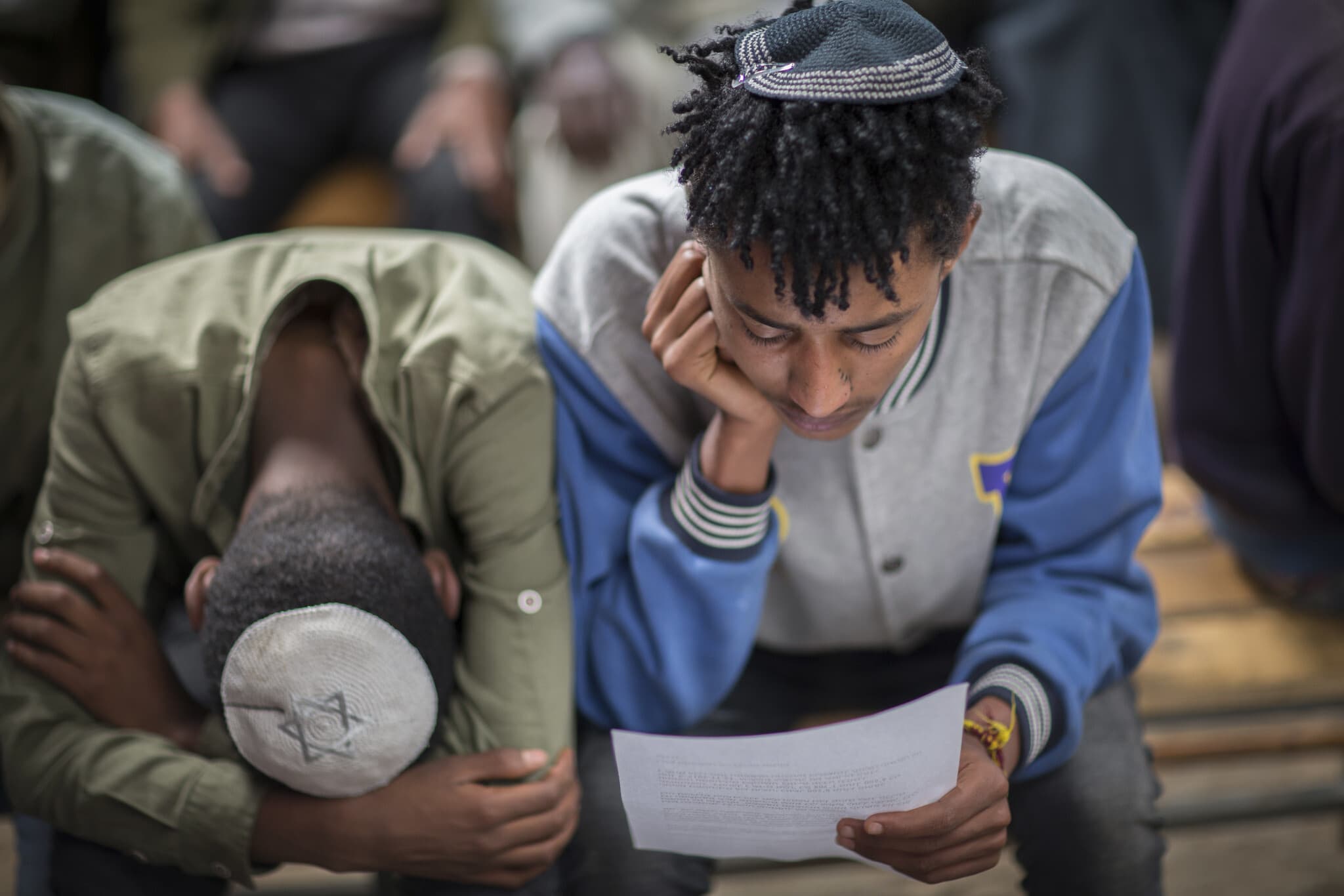 חברי הקהילה היהודית מתאספים כדי למחות על החלטת ישראל שלא לאפשר לכולם לעלות. אדיס אבבה, נובמבר 2018 (צילום: AP Photo / Mulugeta Ayene)