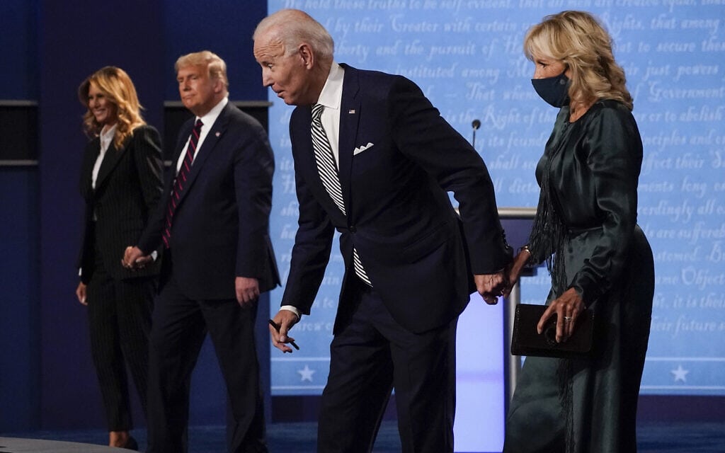 העימות הראשון בין ביידן לטראמפ (בצילום, עם נשותיהם), ספטמבר 2020 (צילום: AP Photo/Julio Cortez)
