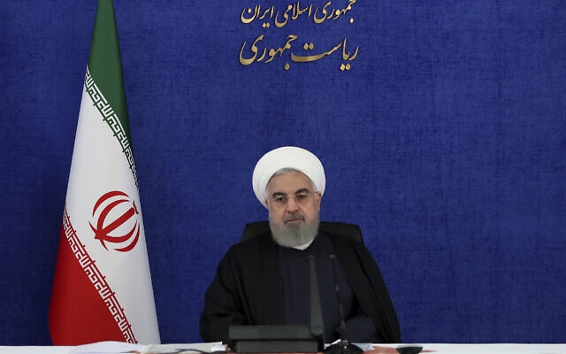 נשיא איראן חסן רוחאני נשבע לנקום על חיסולו של מוחסן פחריזאדה, ב-28 בנובמבר 2020 (צילום: Iranian Presidency Office via AP)