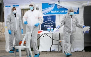 קלפי מיוחדת שהוקמה למען מי שנמצא בבידוד ביתי, בבחירות במרץ 2020 (צילום: נתי שוחט/פלאש90) קלפי מיוחדת שהוקמה למען מי שנמצא בבידוד ביתי, בבחירות במרץ 2020 (צילום: נתי שוחט/פלאש90)