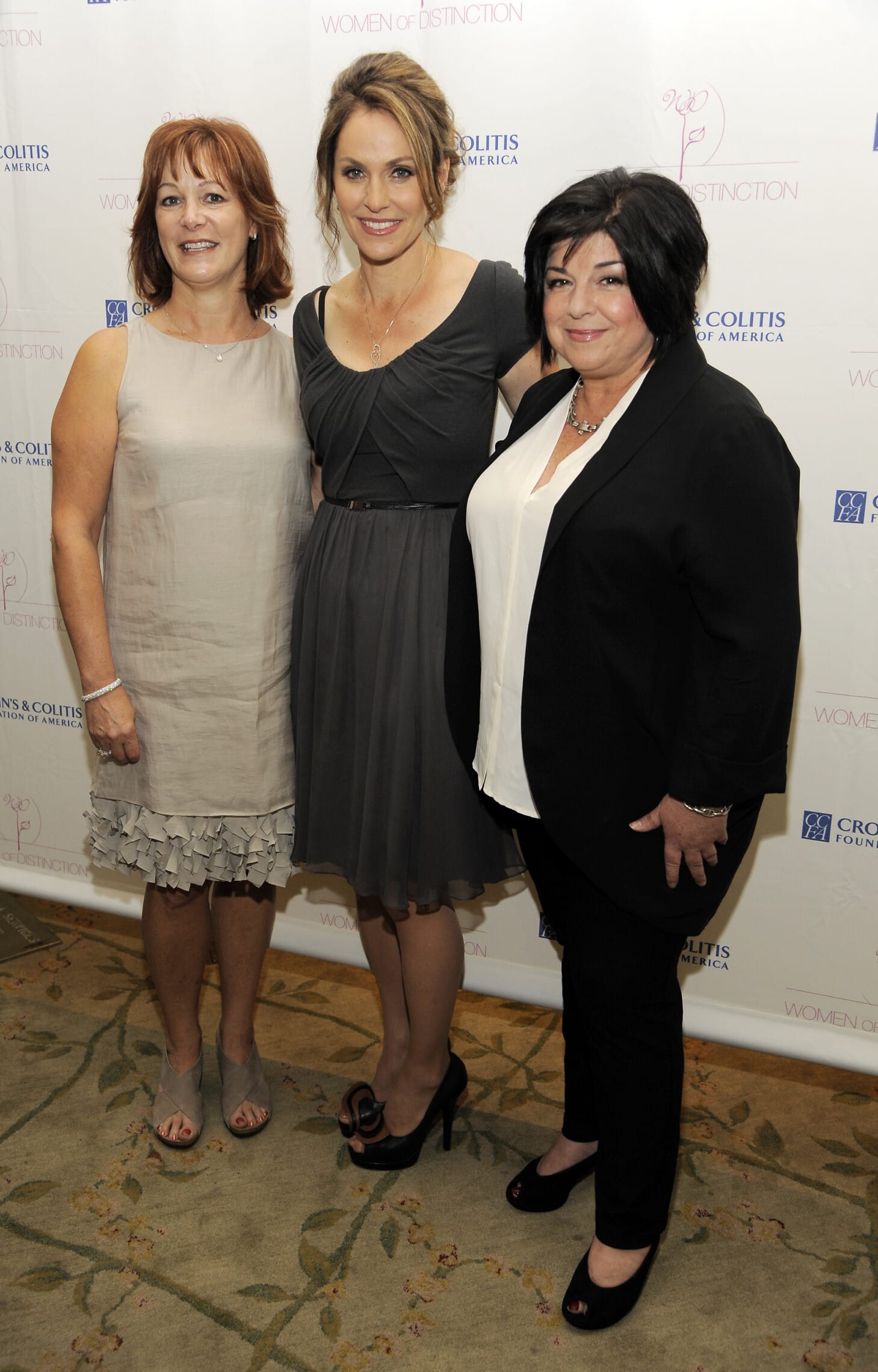 ליסה גריר, משמאל, איימי ברננמן במרז וסוזן קרטסוניס מימין בארוע בבוורלי הילס במאי 2013 (צילום: Chris Pizzello/Invision/AP)