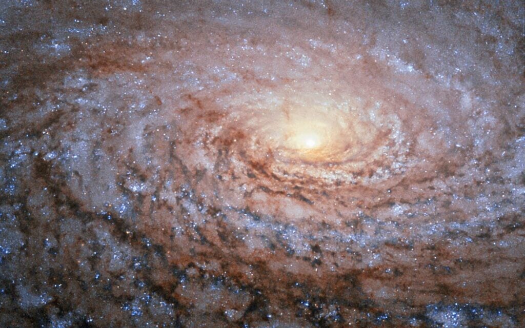 אילוסטרציה: גלקסיה ספירלית M63, נמצאת במרחק של כ־29 מיליון שנות אור מכדור הארץ (צילום: טלסקופ החלל האבל, נאס"א, אי.אס.אי)