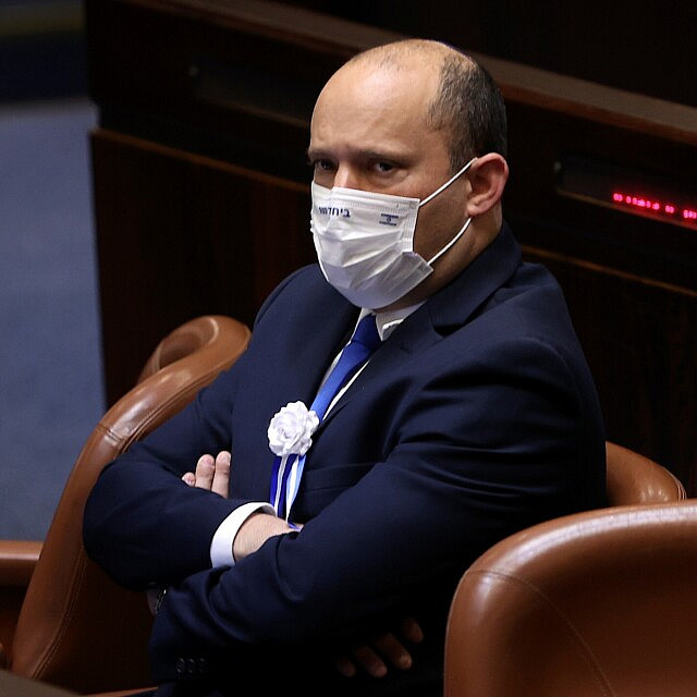 נפתלי בנט בנסת, 6 באפריל 2021 (צילום: Alex Kolomoisky/Pool via AP) נפתלי בנט בנסת, 6 באפריל 2021 (צילום: Alex Kolomoisky/Pool via AP)