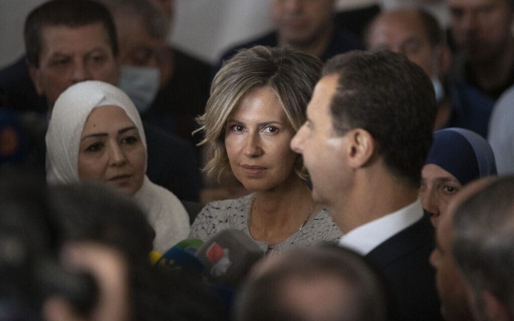 נשיא סוריה בשאר אסד ואישתו עסמה (צילום: AP Photo/Hassan Ammar)
