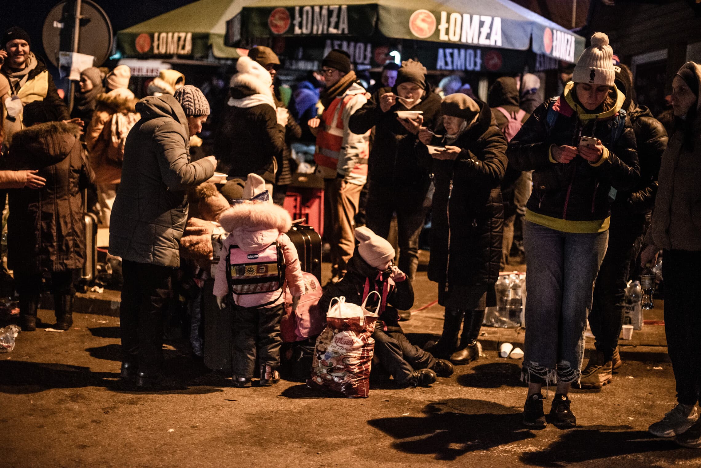 פליטים במתחם המעבר במדיקה, פולין. מרץ 2022 (צילום: גילעד שדה)
