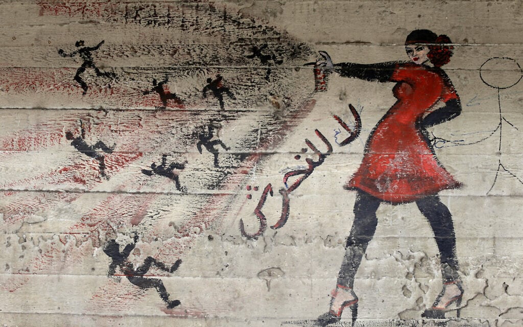 גרפיטי בקהיר, מצרים, נגד הטרדות מיניות (צילום: AP Photo/Hassan Ammar)