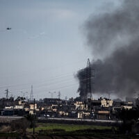 מסוק תקיפה של צבא ארצות הברית באל-חסכה שבצפון מזרח סוריה, 26 בינואר 2022 (צילום: AP Photo/Baderkhan Ahmad, File)