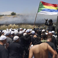 הפגנת תושבים דרוזים נגד הקמת חוות טורבינות ליד מג'דל שאמס. 20 ביוני 2023 (צילום: JALAA MAREY / AFP)
