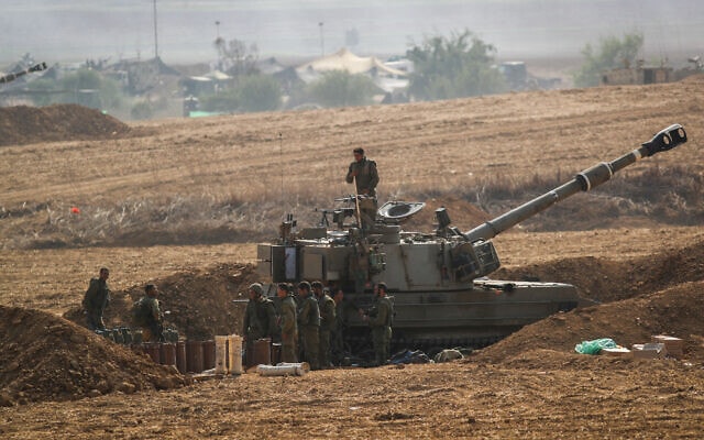 תותח צה"ל סמוך לגבול הרצועה. 11 באוקטובר 2023 (צילום: Oren Ben Hakoon/Flash90) תותח צה"ל סמוך לגבול הרצועה. 11 באוקטובר 2023 (צילום: Oren Ben Hakoon/Flash90)