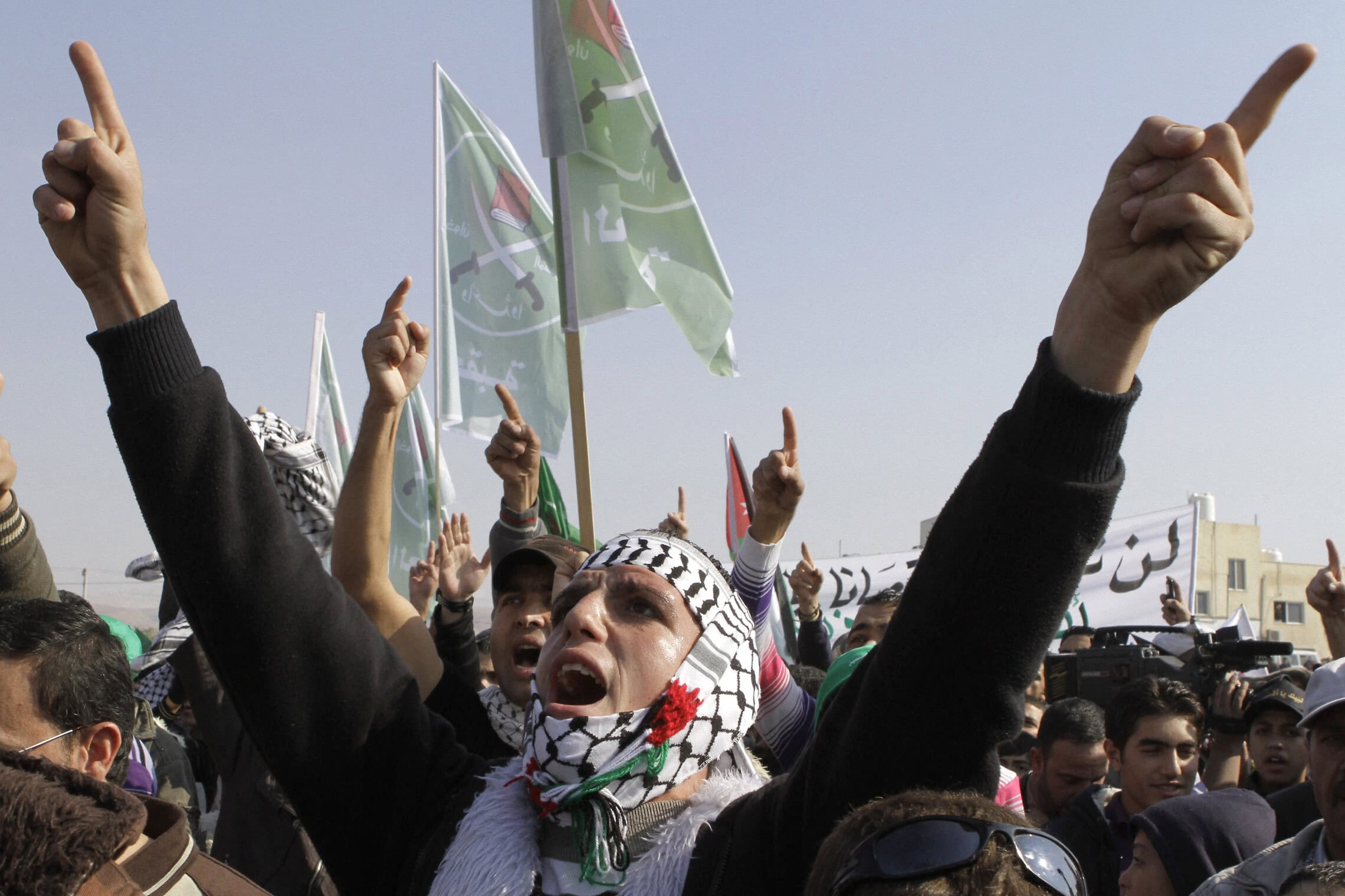 פלסטינים וירדנים בהפגנה לציון 64 שנים לתוכנית החלוקה. 25 בנובמבר 2011 (צילום: Photo by KHALIL MAZRAAWI / AFP)