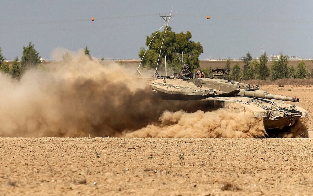 טנק של צה"ל סמוך לגבול עם רצועת עזה, בקרבת קיבוץ נירים, 29 באוגוסט 2024 (צילום: JACK GUEZ / AFP) טנק של צה"ל סמוך לגבול עם רצועת עזה, בקרבת קיבוץ נירים, 29 באוגוסט 2024 (צילום: JACK GUEZ / AFP)