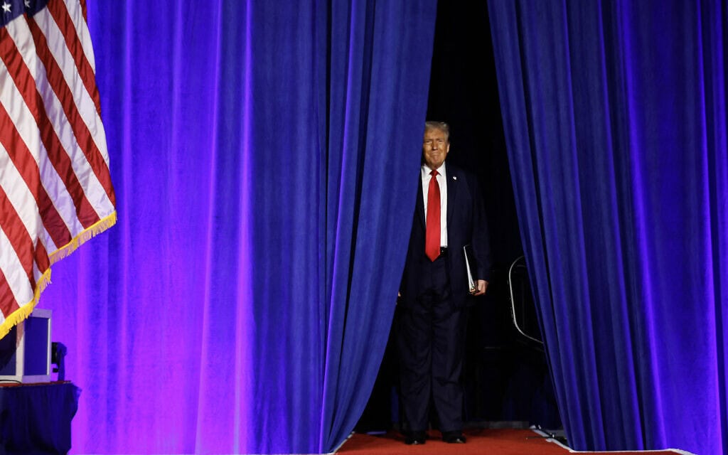 WEST PALM BEACH, FLORIDA - NOVEMBER 06: Republican presidential nominee, former U.S. President Donald Trump arrives to speak during an election night event at the Palm Beach Convention Center on November 06, 2024 in West Palm Beach, Florida. Americans cast their ballots today in the presidential race between Republican nominee former President Donald Trump and Vice President Kamala Harris, as well as multiple state elections that will determine the balance of power in Congress. Chip Somodevilla/Getty Images/AFP (Photo by CHIP SOMODEVILLA / GETTY IMAGES NORTH AMERICA / Getty Images via AFP) WEST PALM BEACH, FLORIDA - NOVEMBER 06: Republican presidential nominee, former U.S. President Donald Trump arrives to speak during an election night event at the Palm Beach Convention Center on November 06, 2024 in West Palm Beach, Florida. Americans cast their ballots today in the presidential race between Republican nominee former President Donald Trump and Vice President Kamala Harris, as well as multiple state elections that will determine the balance of power in Congress. Chip Somodevilla/Getty Images/AFP (Photo by CHIP SOMODEVILLA / GETTY IMAGES NORTH AMERICA / Getty Images via AFP)