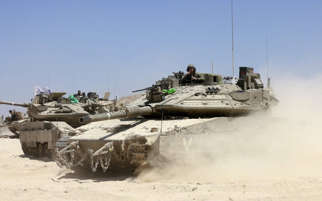 כוח של צה"ל בקרבת הגבול עם רצועת עזה, 8 במאי 2025 (צילום: Menahem KAHANA / AFP) כוח של צה"ל בקרבת הגבול עם רצועת עזה, 8 במאי 2025 (צילום: Menahem KAHANA / AFP)
