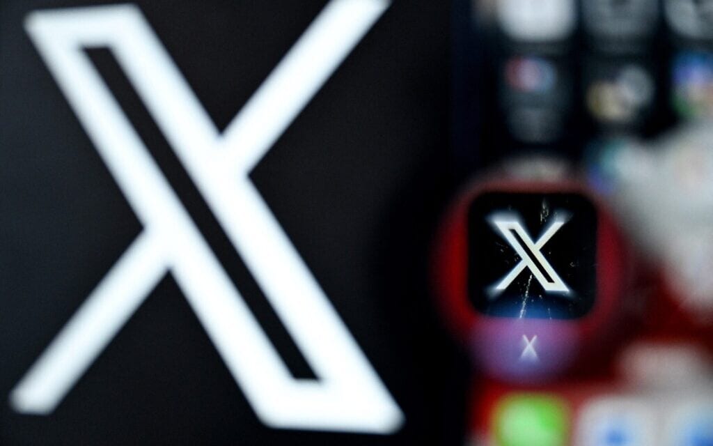 אילוסטרציה: הלוגו של רשת X על מסך סמארטפון (צילום: Kirill KUDRYAVTSEV / AFP) אילוסטרציה: הלוגו של רשת X על מסך סמארטפון (צילום: Kirill KUDRYAVTSEV / AFP)