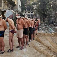 גברים פלסטינים נאספים על ידי צה"ל במחנה ג'באליה, 10 בדצמבר 2023