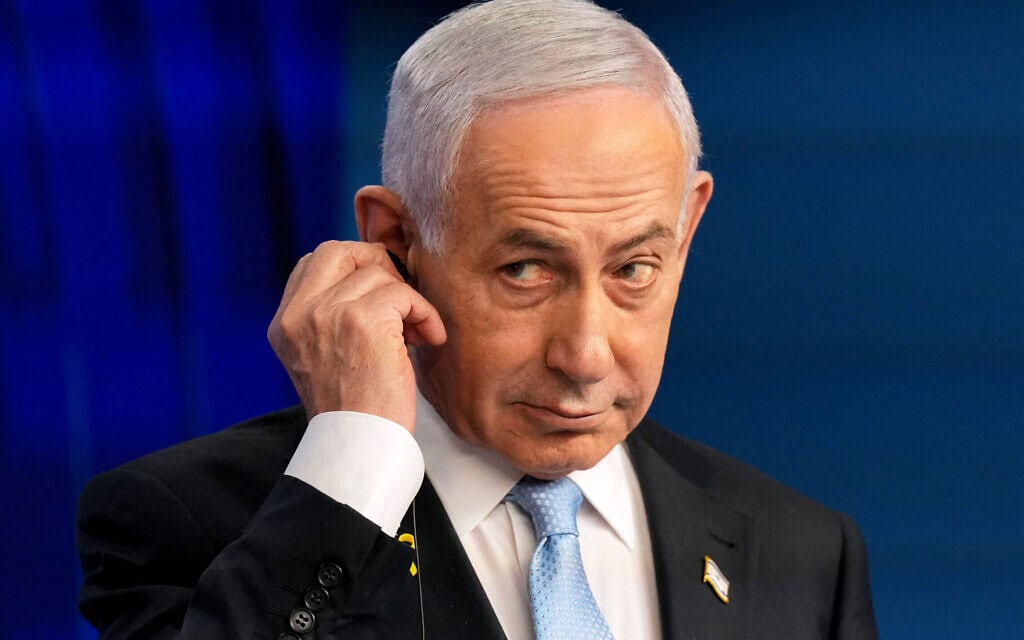 בנימין נתניהו במסיבת עיתונאים משותפת עם קנצלר גרמניה פרידריך מרץ בירושלים, 7 בדצמבר 2025 (צילום: Ariel Schalit / POOL / AFP)