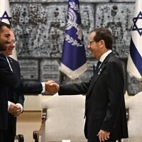 נשיא המדינה יצחק הרצוג ותומר לוי. 3 בדצמבר 2025