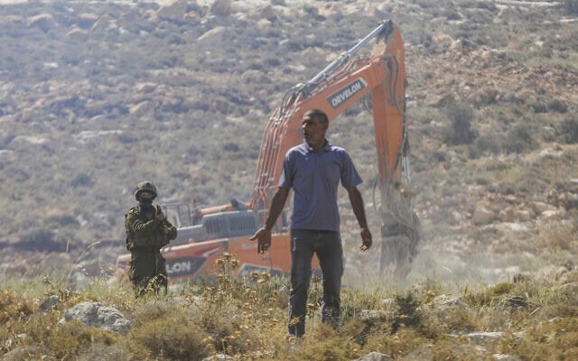 חיילי צה"ל מתעמתים עם פלסטינים בחרבת חומזה, מערבית לחברון, 9 ביוני 2026