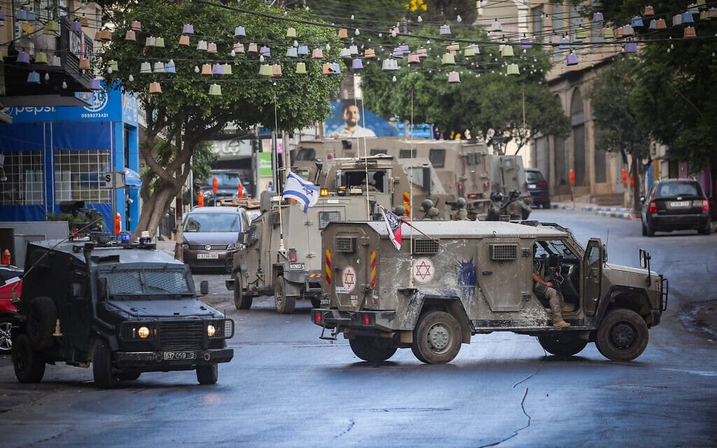 כוחות הביטחון הישראליים פועלים במהלך פשיטה בעיר שכם שבגדה המערבית. 26 ביולי 2026 (צילום: Nasser Ishtayeh/Flash90) כוחות הביטחון הישראליים פועלים במהלך פשיטה בעיר שכם שבגדה המערבית. 26 ביולי 2026 (צילום: Nasser Ishtayeh/Flash90)